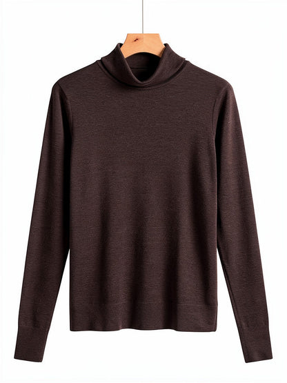 Treacle brown wool roll neck top on a wooden hanger, showing the folded roll collar and fine rib