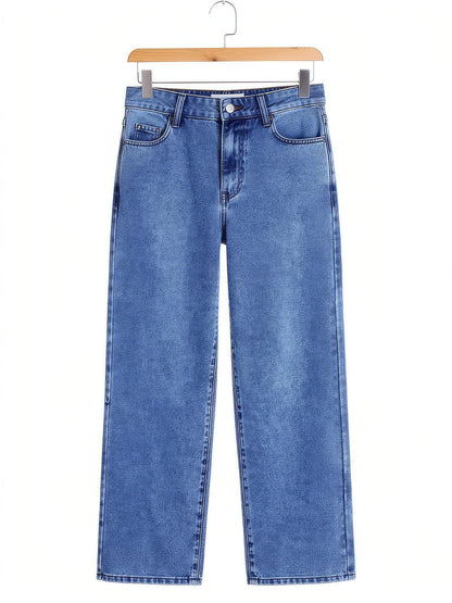 Mid Blue wide-leg jeans on a wooden hanger, showing the stonewashed denim and wide leg