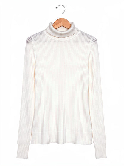 Vellum white wool roll neck top on a wooden hanger, folded roll collar and fine vertical rib
