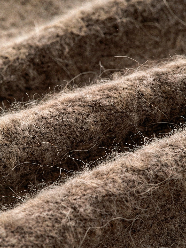 Close up of the brushed alpaca knit showing the soft halo of fibres