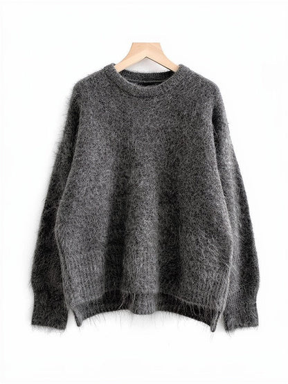 Granite grey brushed alpaca jumper on a wooden hanger, oversized with dropped shoulders
