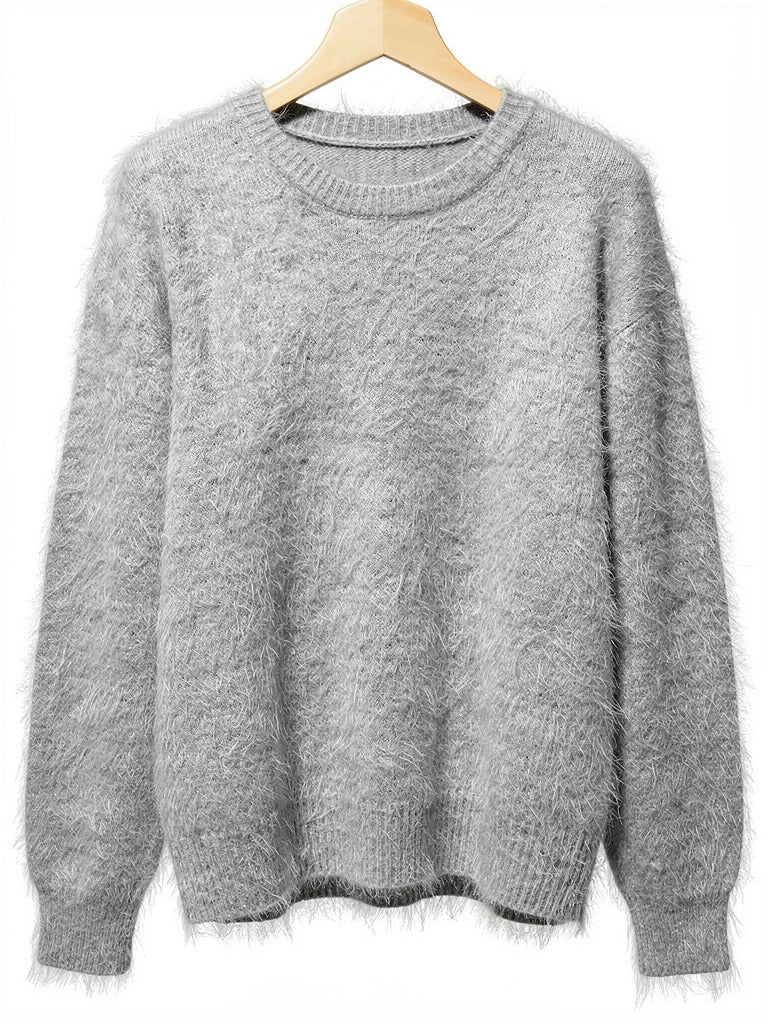 Silver grey brushed alpaca jumper on a wooden hanger, oversized with dropped shoulders