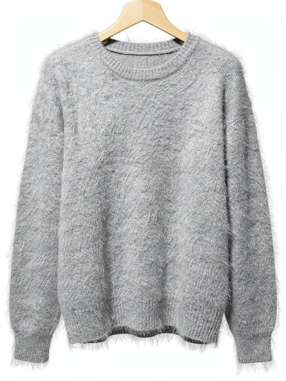 Silver grey brushed alpaca jumper on a wooden hanger, oversized with dropped shoulders