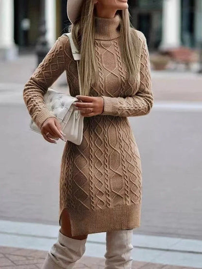 The camel Aran cable-knit jumper dress worn with cream knee-high boots