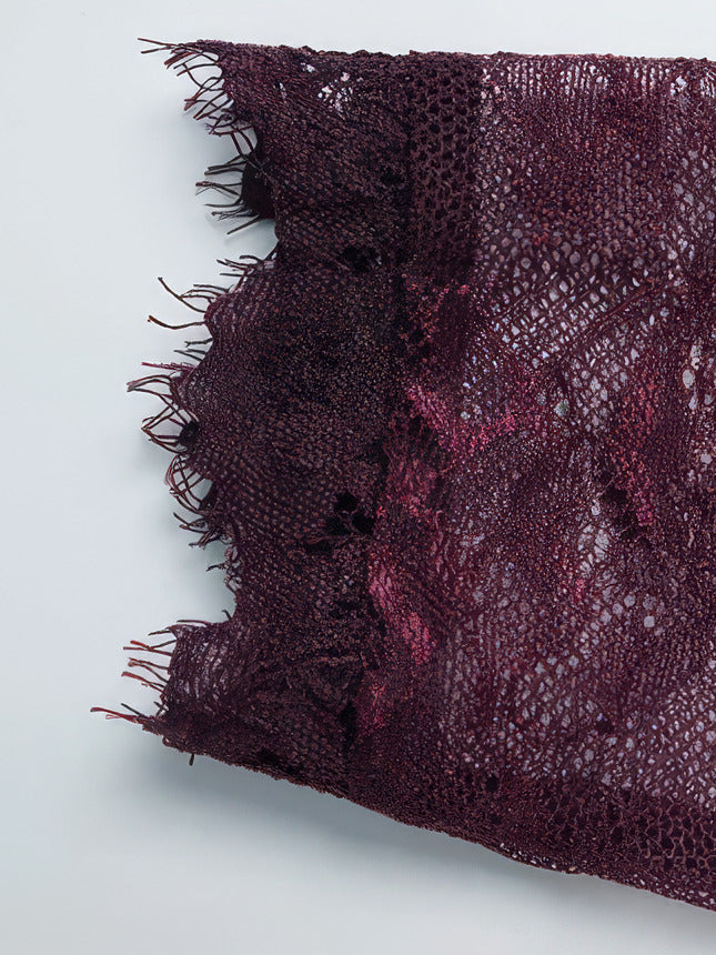 Close-up of the unfinished eyelash lace edge at the cuff of the Mulberry lace dress