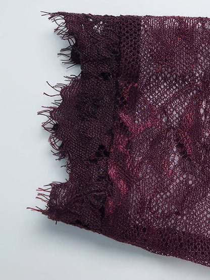 Close-up of the unfinished eyelash lace edge at the cuff of the Mulberry lace dress
