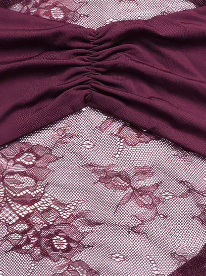 Close-up of the ruched jersey bust panel meeting the floral lace waist band of the Mulberry lace dress