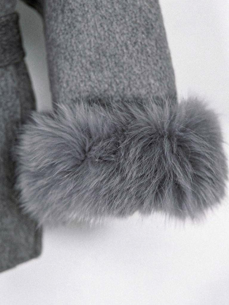 Close up of the deep faux fur cuff and brushed cloth of the belted coat