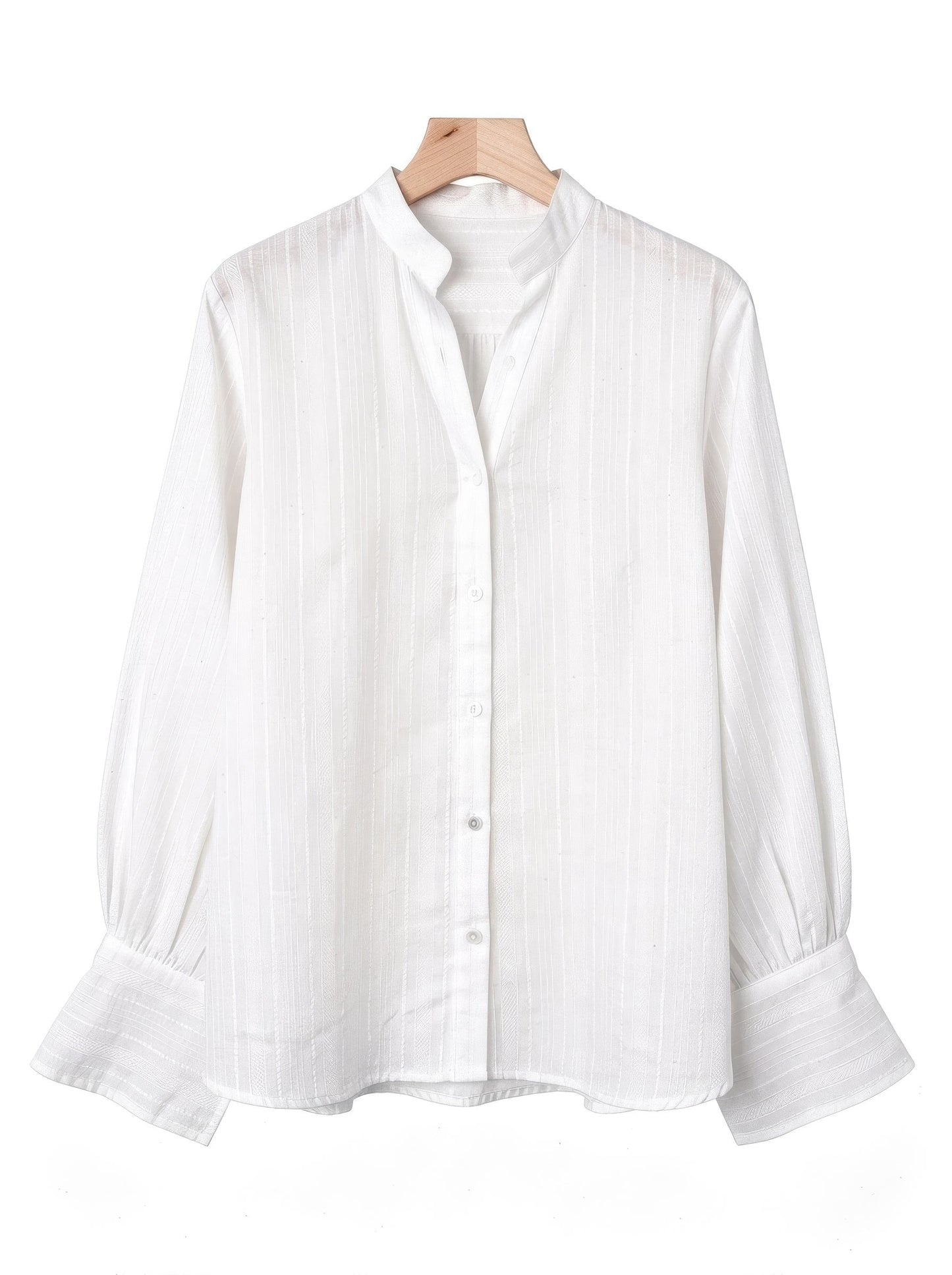 White bishop-sleeve tunic shirt in self-stripe voile on a wooden hanger, front view