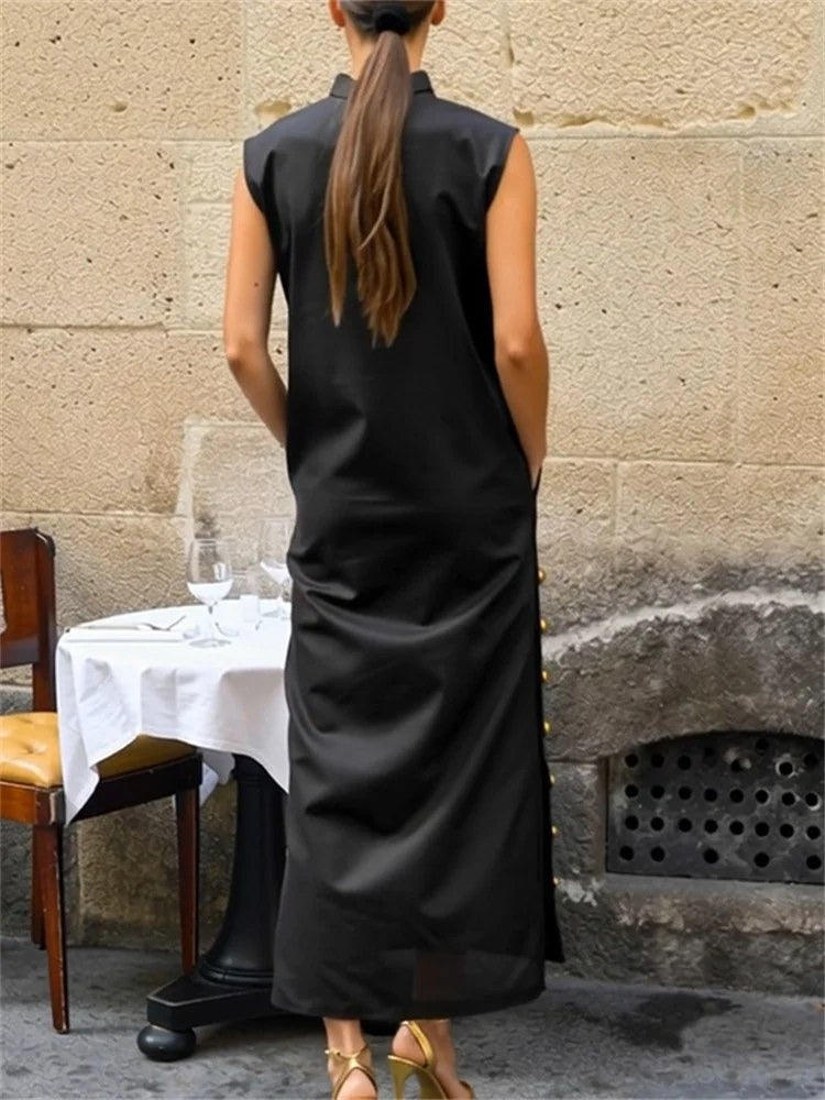 Black column dress seen from the back, showing the plain back and the stand collar