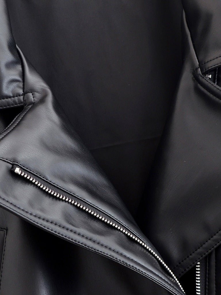 Close up of the silver tone moto zip and the smooth faux leather of the Salperton jacket