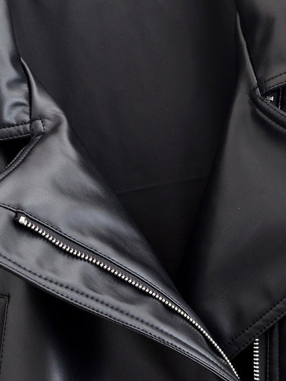 Close up of the silver tone moto zip and the smooth faux leather of the Salperton jacket