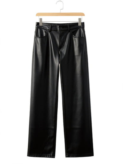 Black faux leather trousers in Pitch Black, front view on a hanger