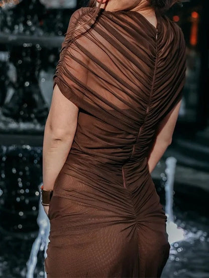 Ruched back of the Chicory brown maxi dress, closed from the collar to the hem
