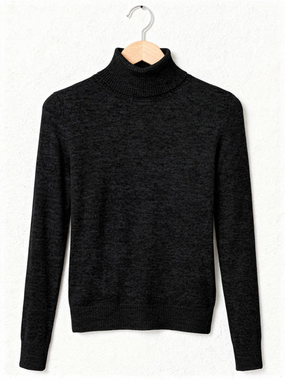 Black roll neck jumper on a wooden hanger, fold-over ribbed collar and fine knit
