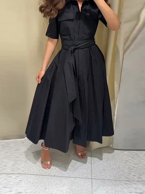 Black shirt dress worn with the self-fabric belt tied at the waist