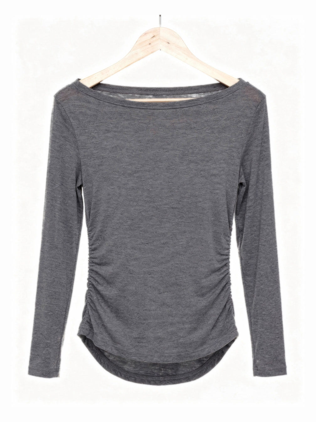 Smoke grey boat neck top on a hanger showing the wide slash neckline and the ruched side seams