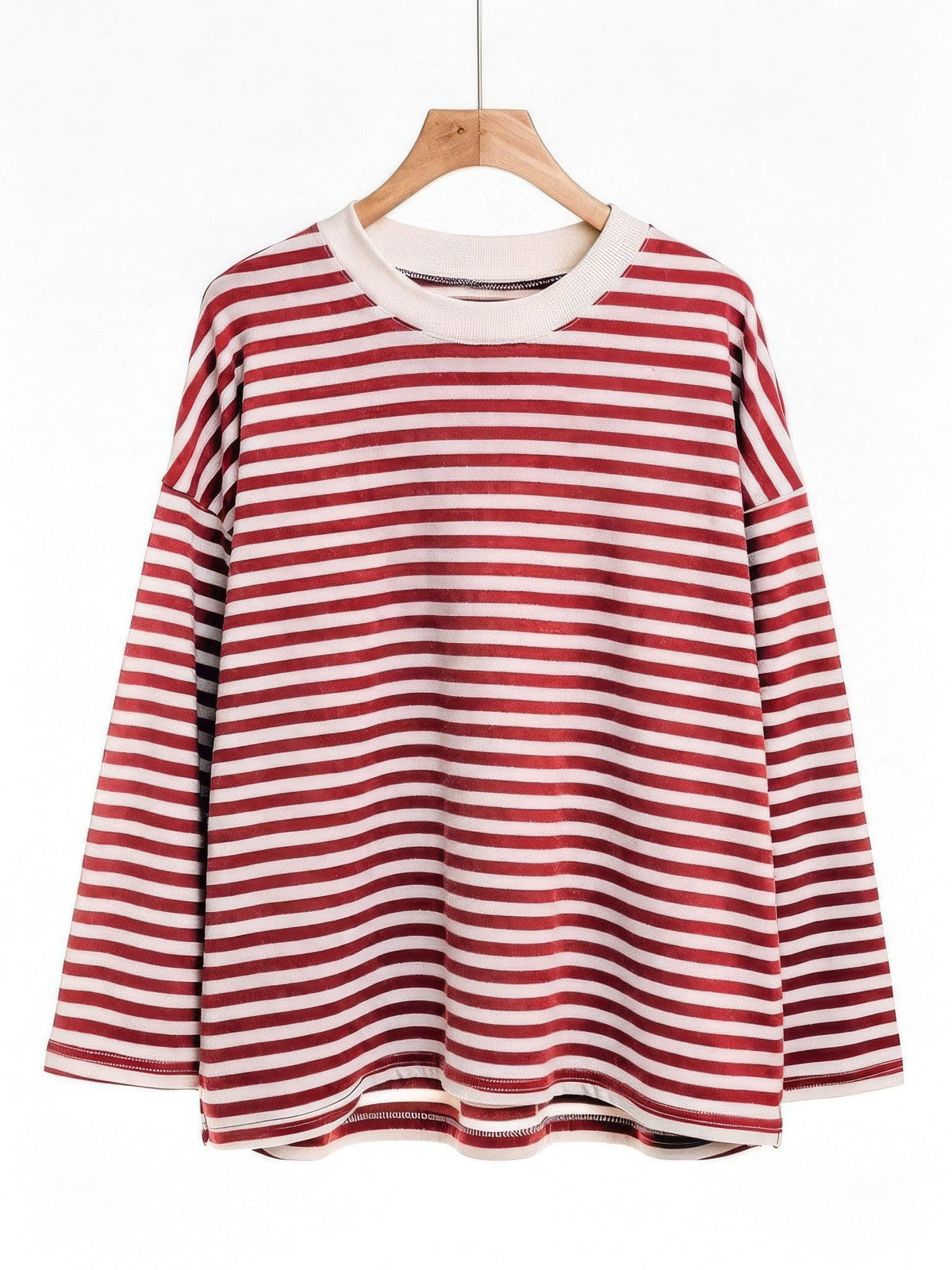 Cherry red and white breton stripe top on a wooden hanger, front view