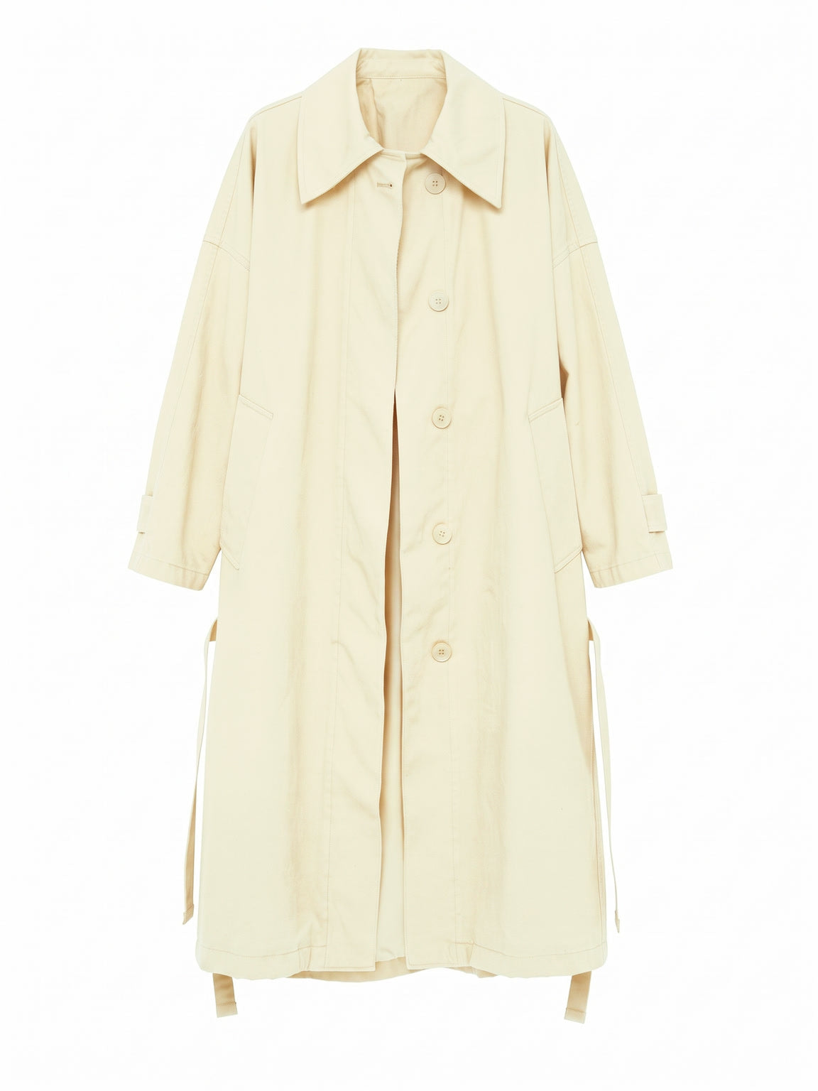 Brown coat in Beeswax, front view showing the raglan sleeves and cuff straps