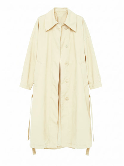 Brown coat in Beeswax, front view showing the raglan sleeves and cuff straps