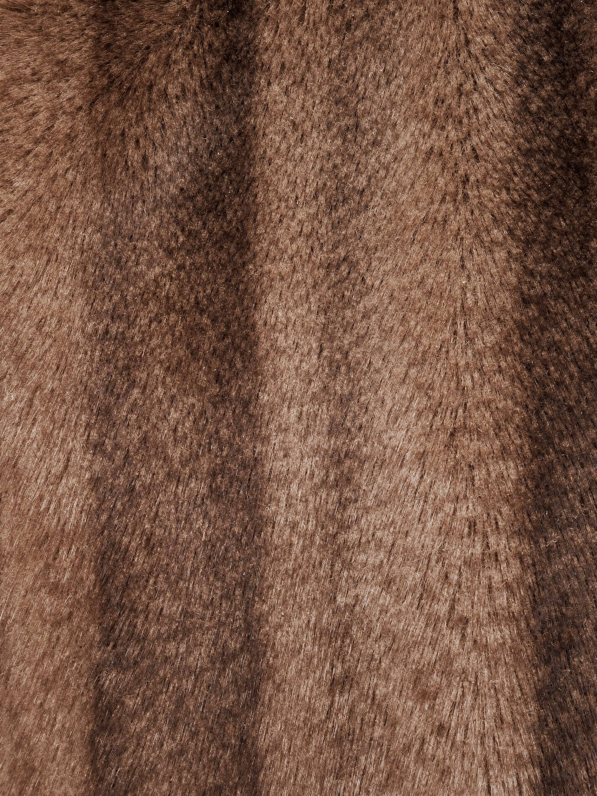 Close up of the short glossy faux fur pile with its soft vertical bands