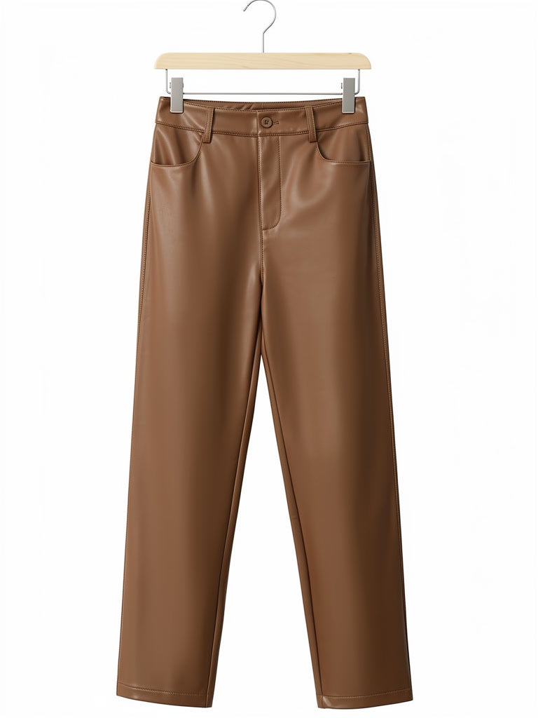 Brown faux leather trousers in Toffee on a wooden hanger, front view