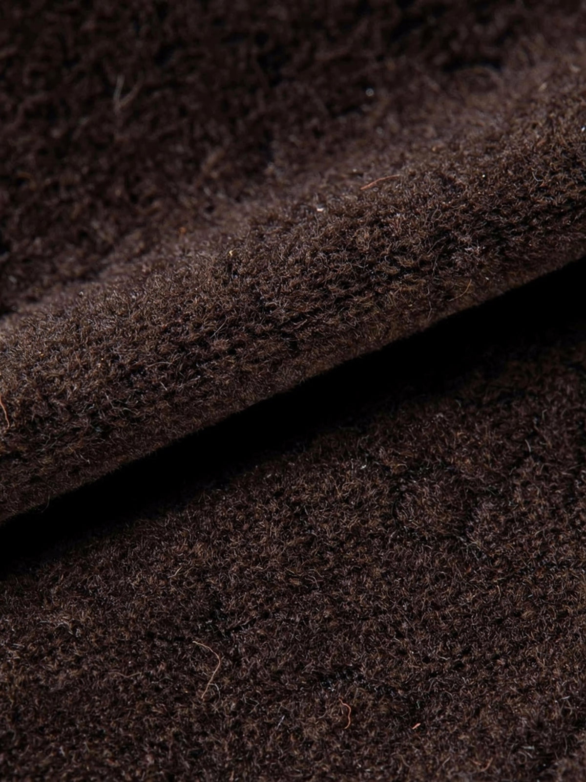 Close up of the matte brushed cloth of the brown A line midi skirt