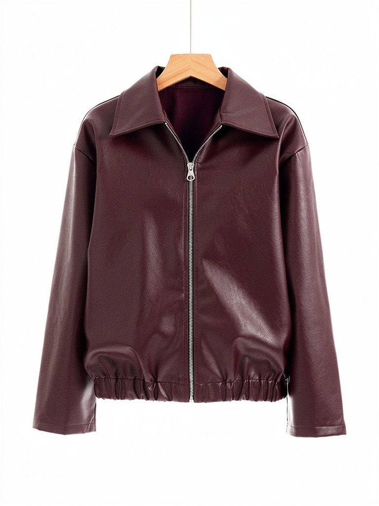 Burgundy faux leather jacket on a hanger, front view with the point collar