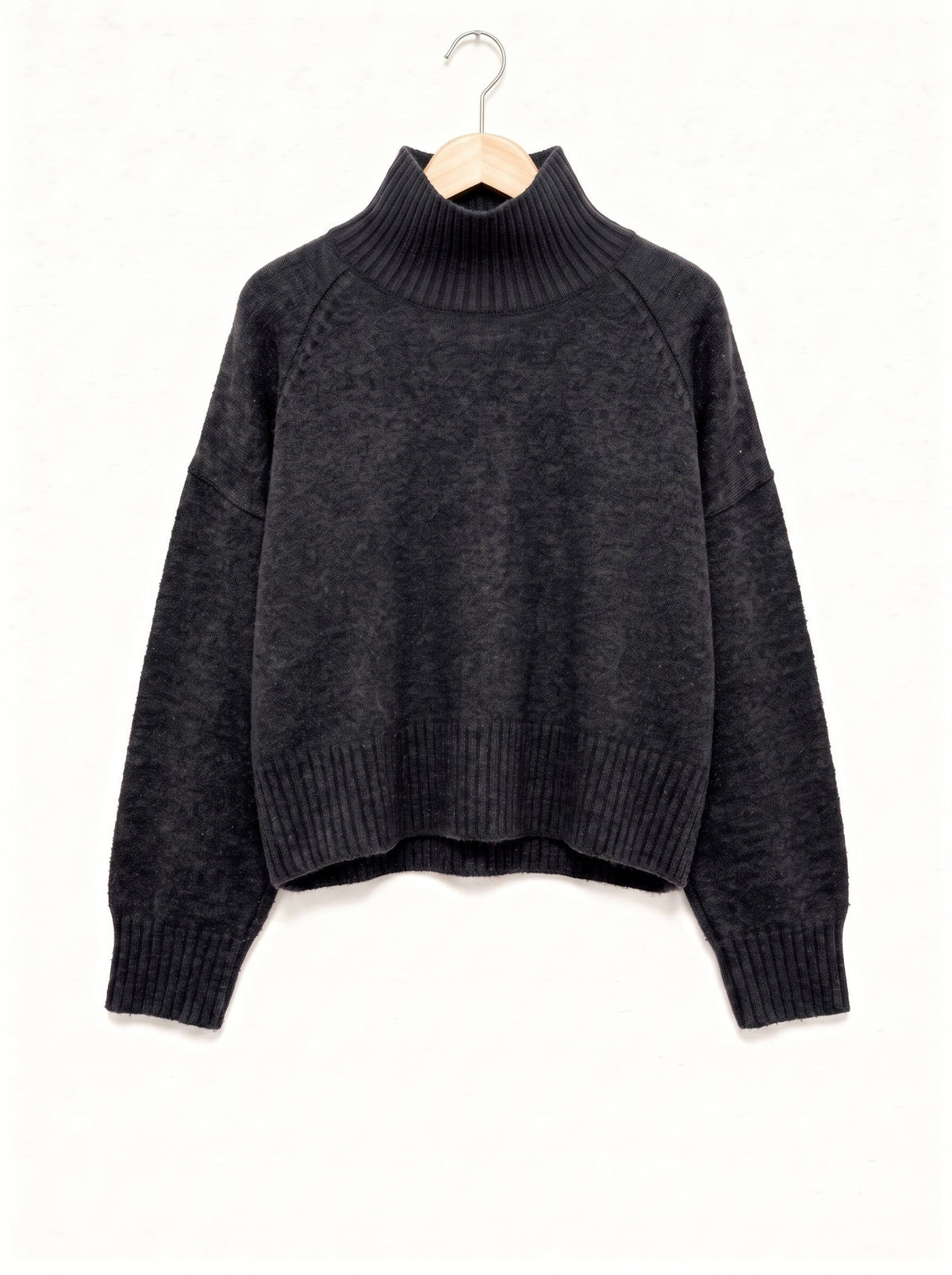 Fawsley jumper in charcoal marl knit, ribbed funnel neck and raglan sleeves, on a wooden hanger