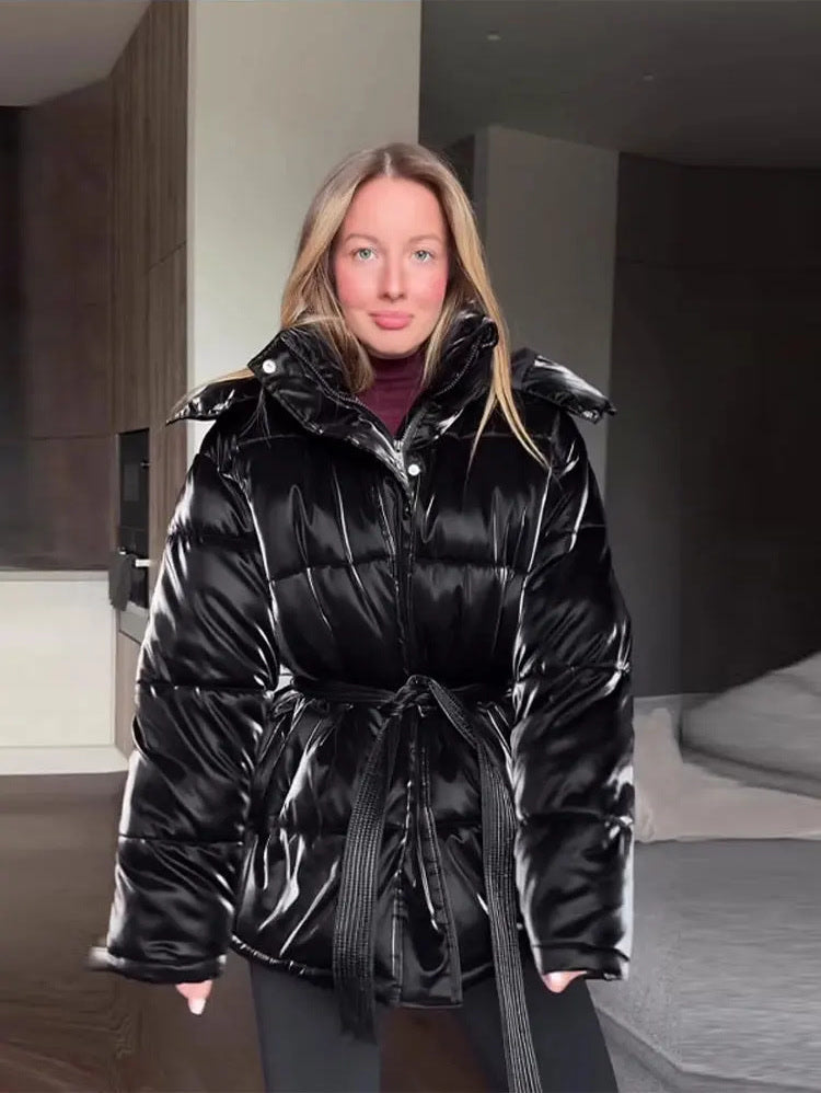 Puffer jacket in Jet black, belted and worn