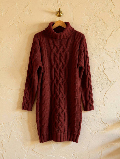 Wine red cable-knit roll-neck jumper dress on a wooden hanger