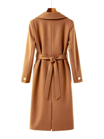 Camel belted longline wrap coat on a hanger, back view with the tied belt and centre vent