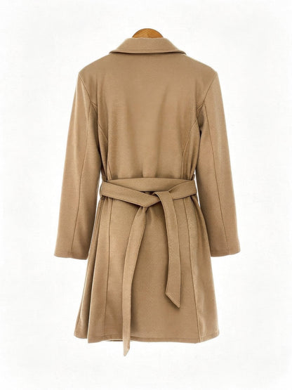 Camel overcoat in Caramel, back view with the self tie belt knotted at the back