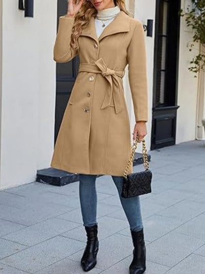 Camel overcoat worn with the belt tied at the waist