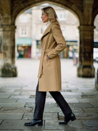 Camel overcoat in Caramel worn in profile, knee length