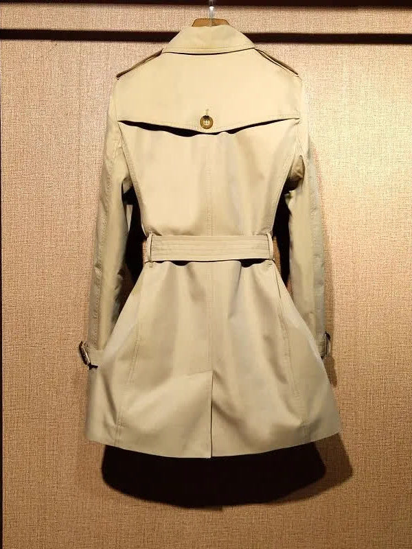 Camel belted trench coat, back view