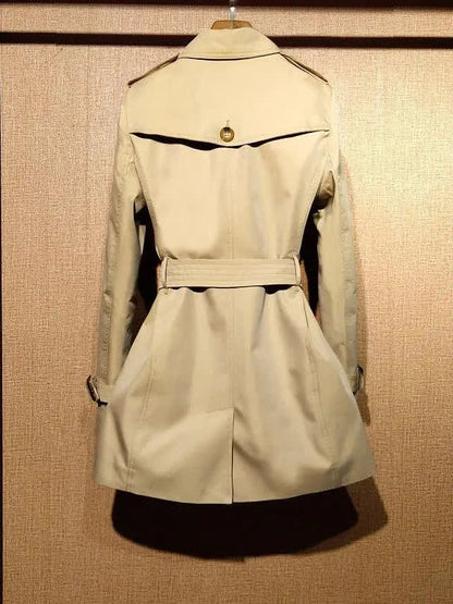 Camel belted trench coat, back view