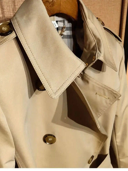 Camel trench coat collar, epaulette and gun flap detail