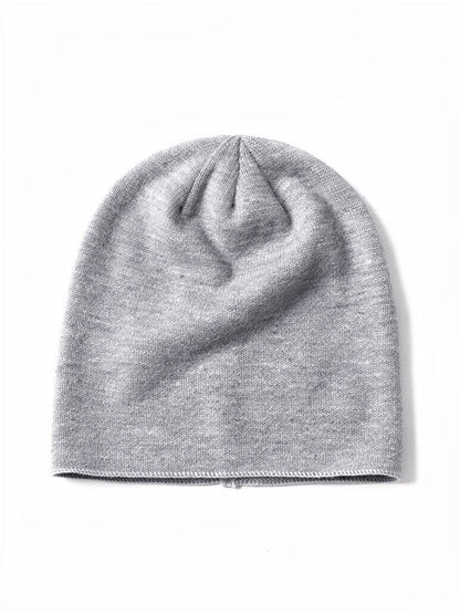 Grey cashmere beanie, front view, showing the fine plain knit and single chained edge