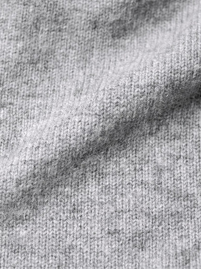 Close-up of the brushed cashmere knit of the beanie, fine plain stocking stitch