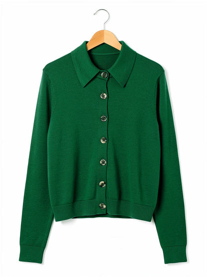 Cashmere cardigan in Racing Green on a hanger, knitted shirt collar and seven button front