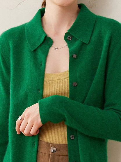 Cashmere cardigan in Racing Green worn open over a knitted top