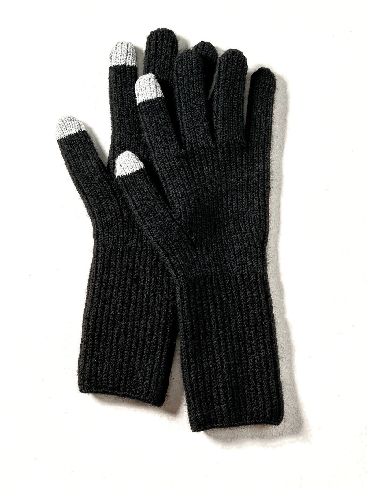Cashmere gloves in Chough black, shown as a pair with the grey touchscreen tips