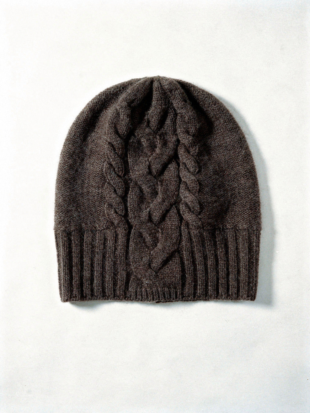 Truffle cashmere hat with a plaited cable panel and fine ribbed band