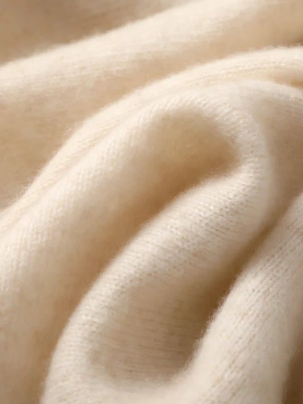 Soft brushed knit of the cashmere scarf shown in close folds