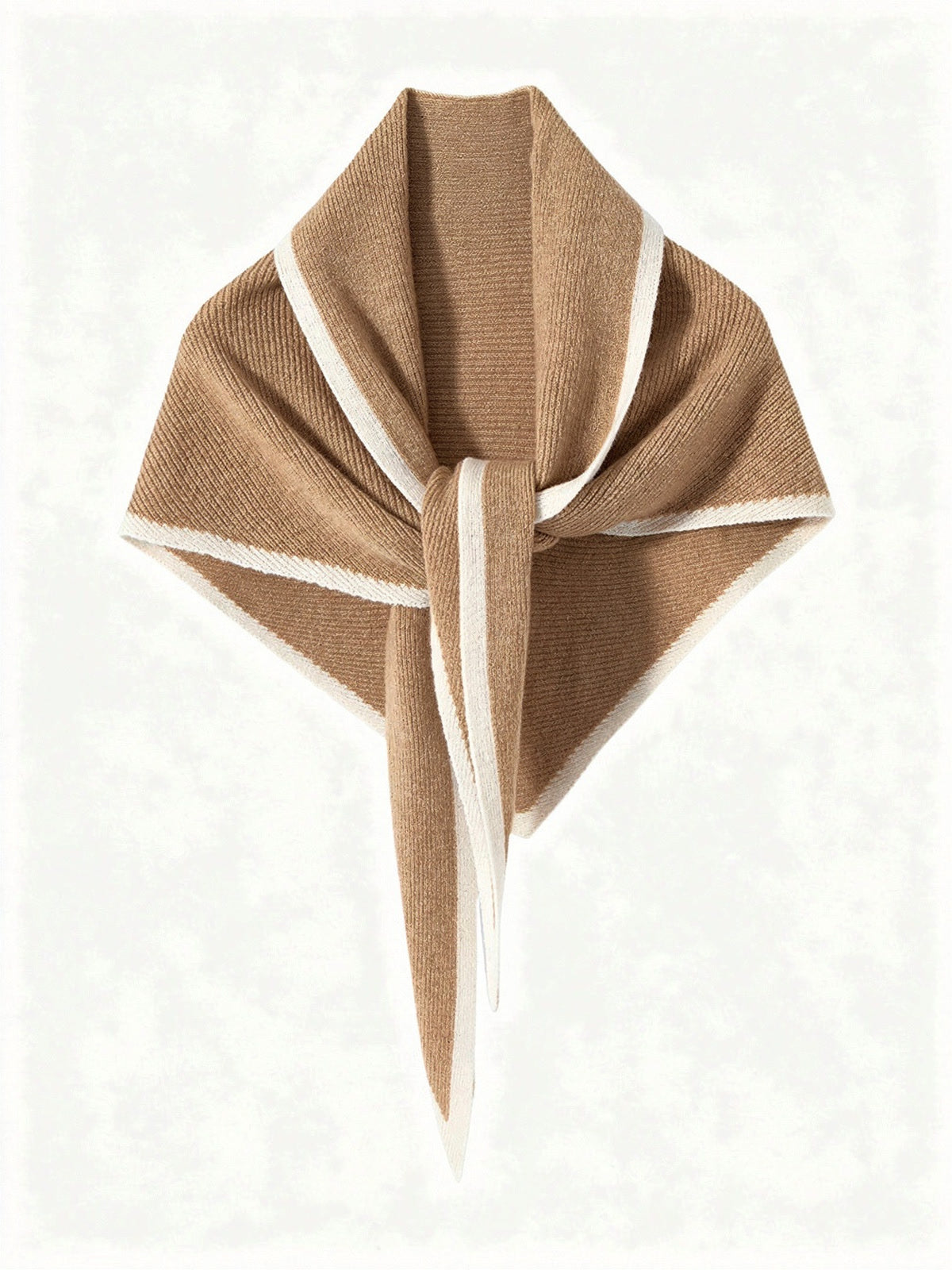 Cashmere triangle scarf in Sedge, knotted, showing the knitted contrast edge