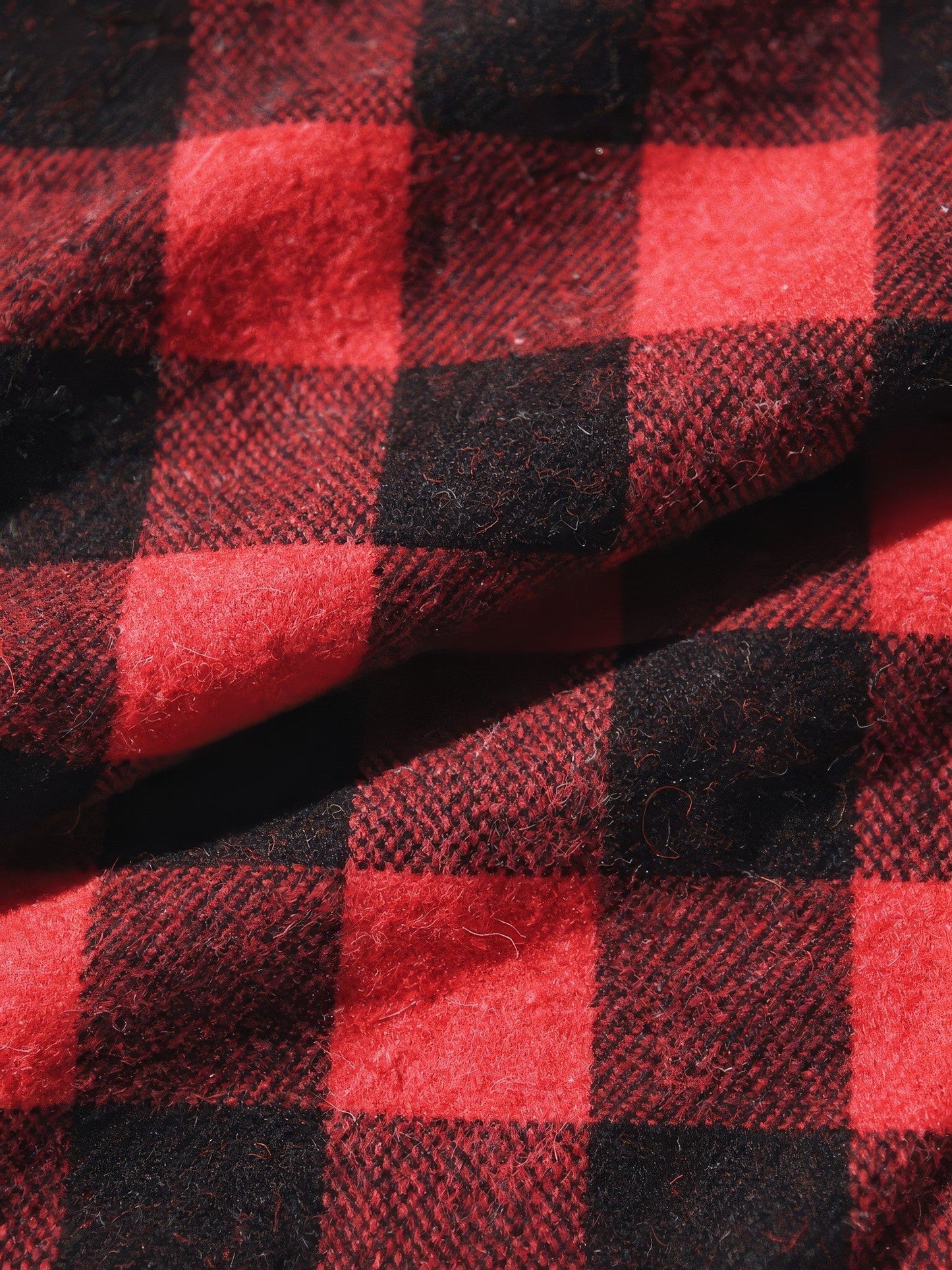 Close-up of red buffalo check brushed flannel fabric