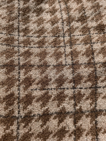 Close up of the brushed houndstooth check cloth with its faint wider overcheck