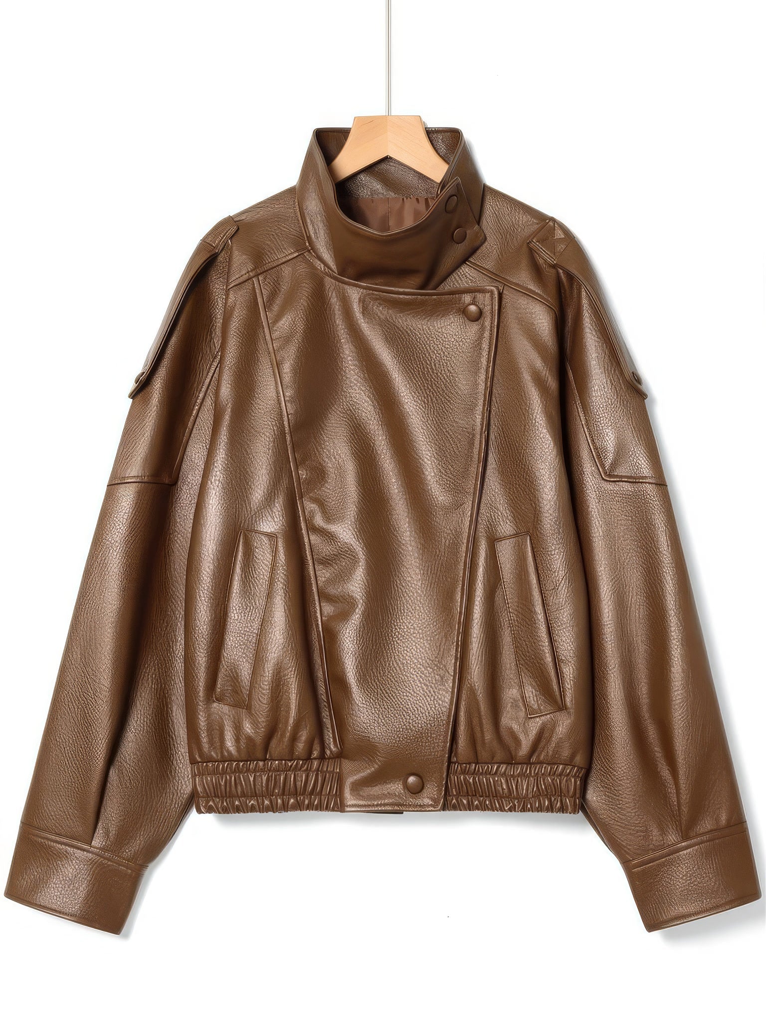 Cognac tan faux leather jacket with stand collar on a hanger