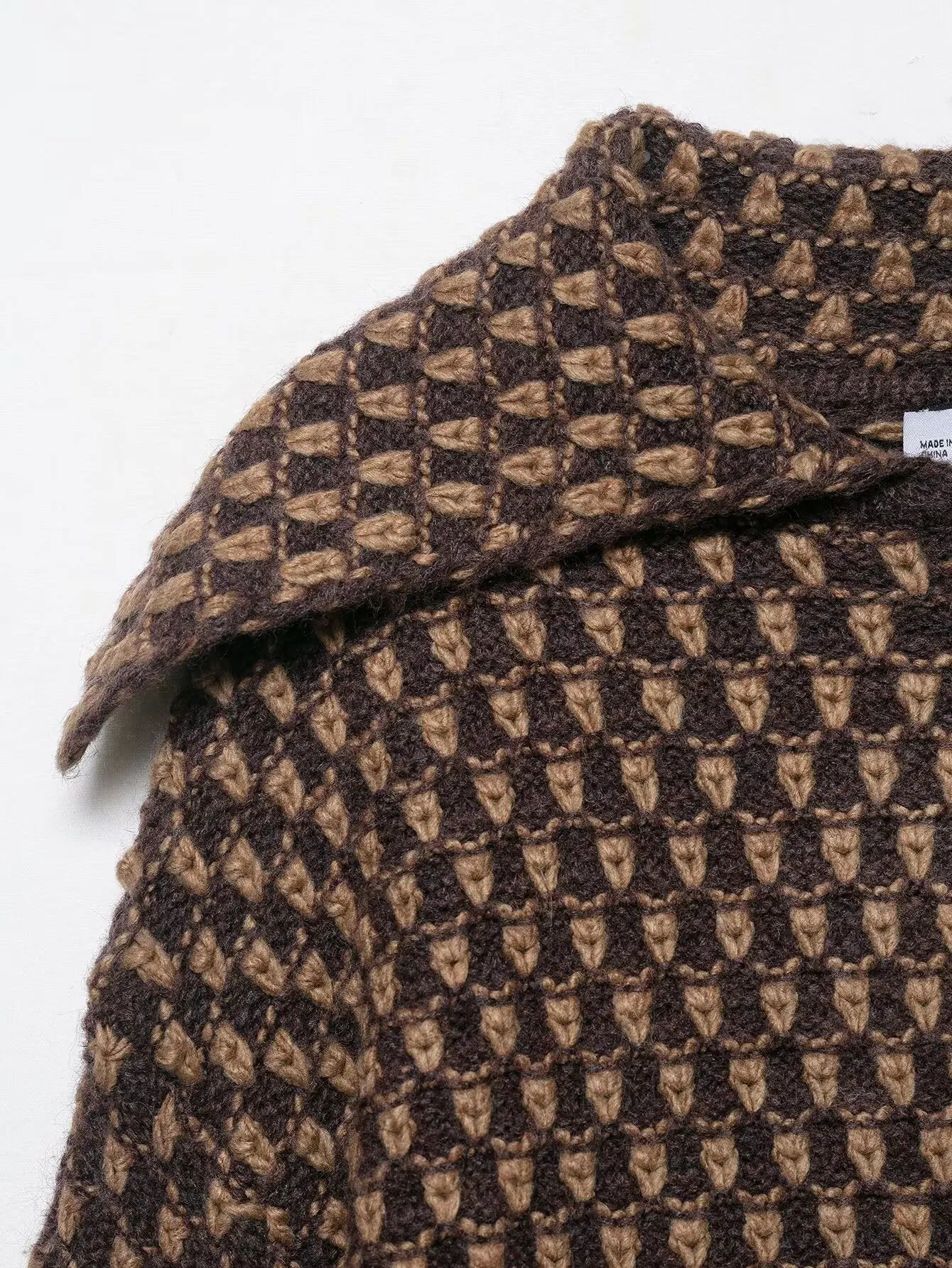 Close-up of the chunky two-tone honeycomb knit texture of the Ledbury cardigan